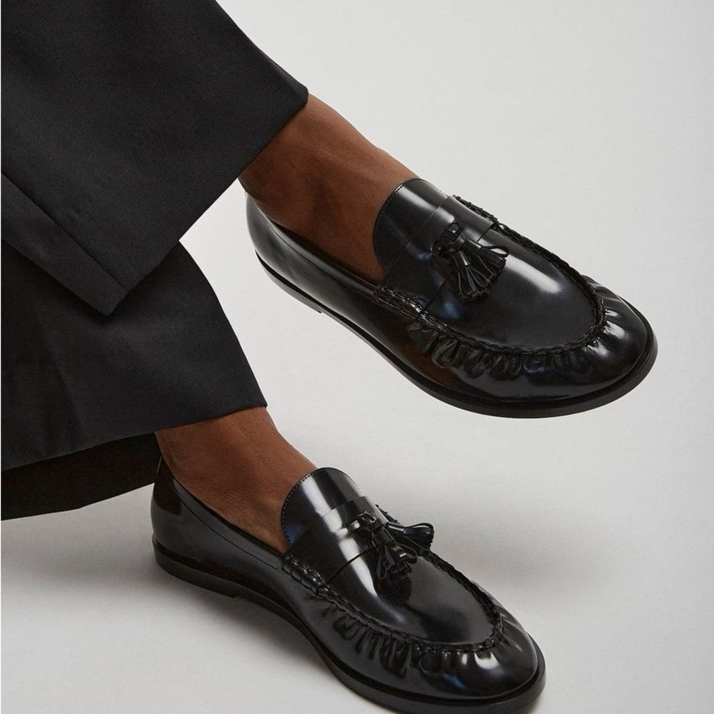 The Row Black Tassel Loafers